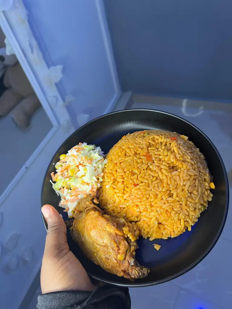 Freshly prepared Nigerian Jollof Rice photo